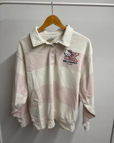 Hello Kitty wit roze sweater · maat M