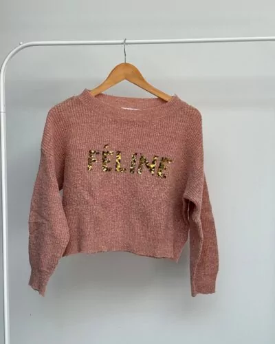 Millenium roze sweater · maat 12 jaar